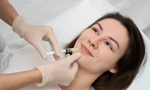 close-up-woman-lip-filler-procedure-scaled